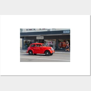 Red Morris 8 car in deco city of Napier New Zealand. Posters and Art